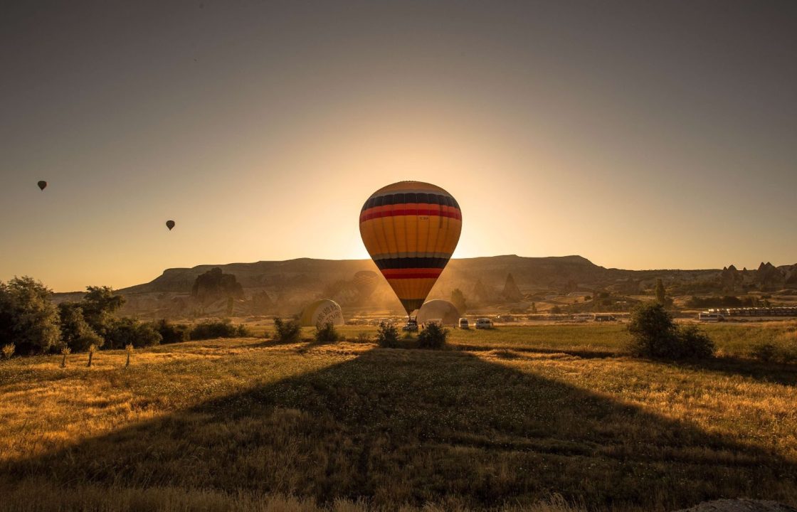 A hot air balloon at sunset