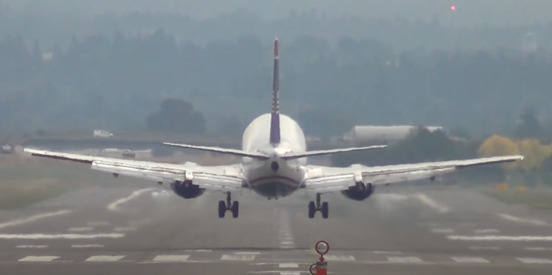 Airplane flying low above the ground