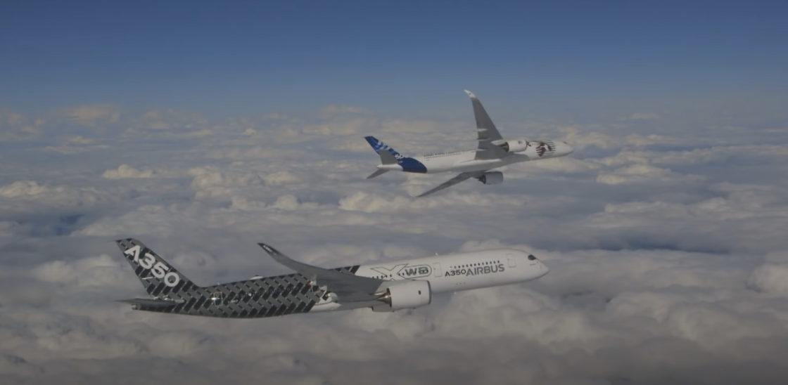 Two Airbus A350 XWB aircraft flying in the sky