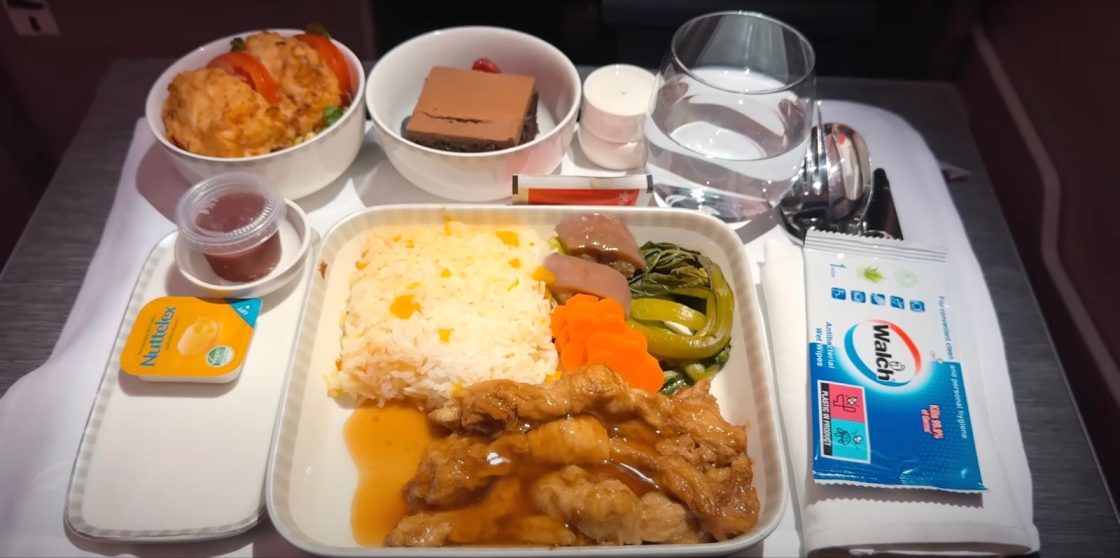 Tray with food on board an airplane